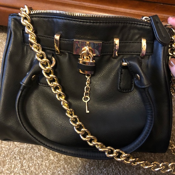 Black handbag with gold hardware, size is 10" x 8" x 4". - Picture 4 of 4